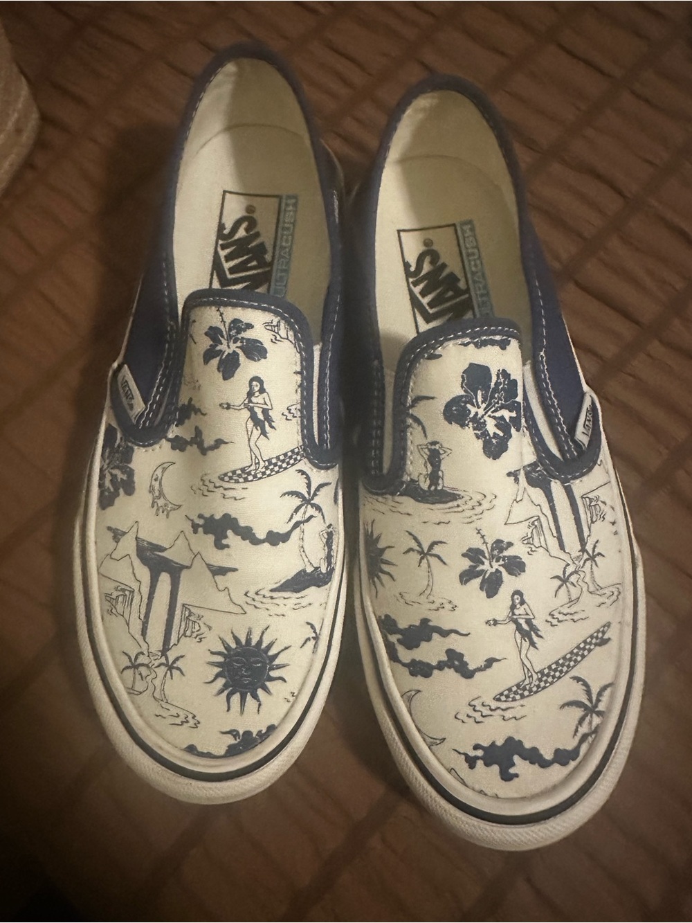 Vans Slip-On Sneakers in Navy and White Hawaiian Sketch Print